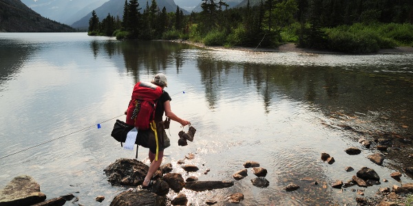 Hiker at Cosley Lake, Glacier National Park