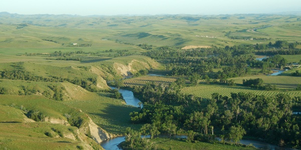 River winding through green hills